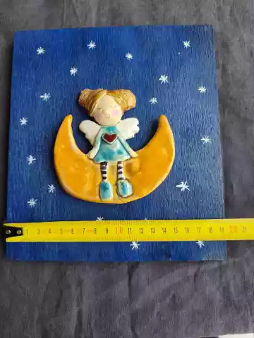 anioł ceramiczny na desce
